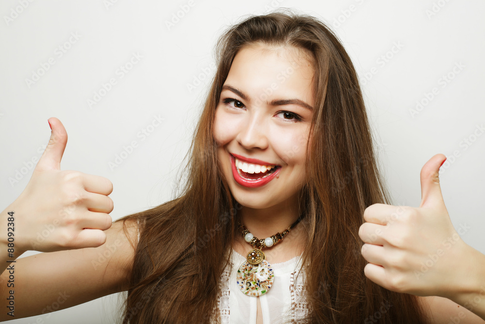Beautiful young surprised woman. Studio shot. Beautiful young surprised woman. Studio shot.