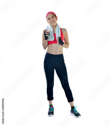 Middle aged woman with exercise towel and water