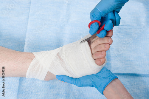 doctor cut bandage