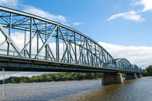 Fototapeta Naklejka Na Ścianę i Meble -  Torun famous truss bridge over Vistula river, Poland. 