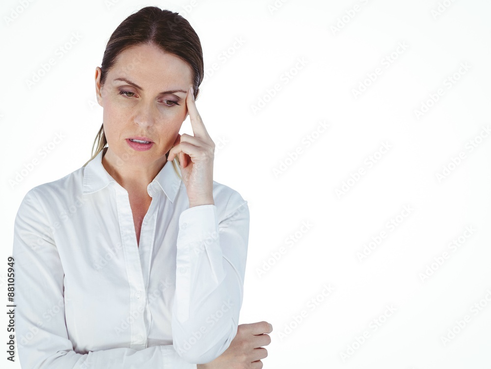Beautiful businesswoman thinking with finger on head Beautiful businesswoman thinking with finger on head