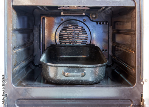 empty pan in an open oven