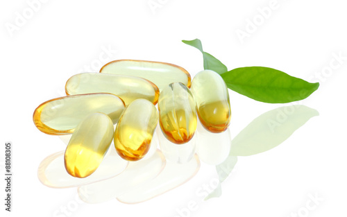yellow vitamin omega3 fish oil capsule on white background