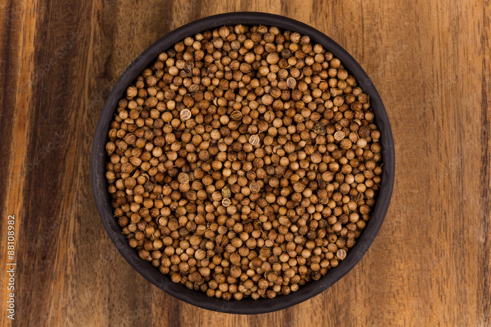 Close up of dried coriander seeds in a bowl Close up of dried coriander seeds in a bowl