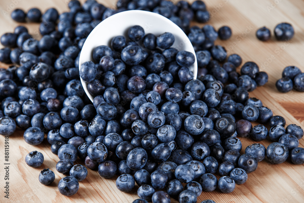 Fresh Organic Blueberries on wooden table. Background Fresh Organic Blueberries on wooden table. Background