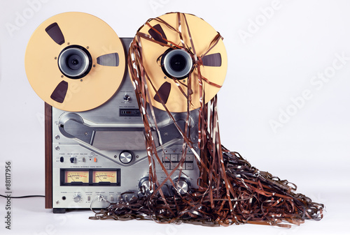 Open Reel Tape Deck Recorder Player with Messy Entangled Tape photo