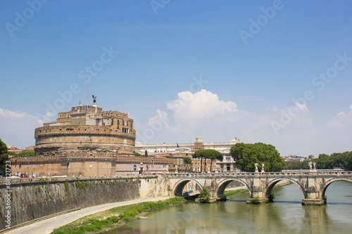 View on famous Saint Angel castle and bridge over the Tiber river in Rome, Italy