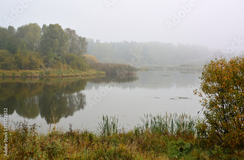 Foggy autumn lake