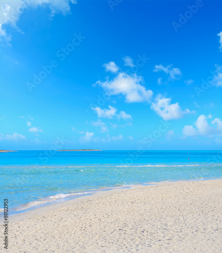 soft clouds over La Pelosa beach