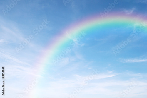 Fototapeta rainbow in the clear blue sky after the rain, the rainy season.