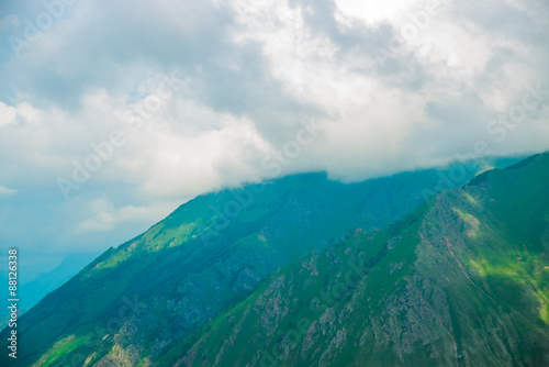 Beautiful blue-green mountains in the mist.Cloudy.Summer.The Caucasus. .Russia. photo