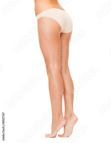 woman with long legs in cotton underwear