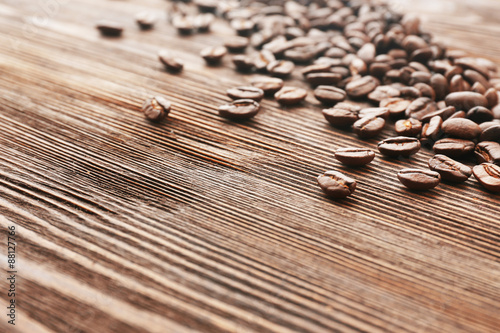 Coffee beans on wooden background