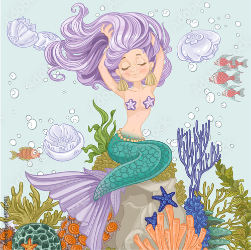 Beautiful mermaid straightens hair sitting on a rock with algae