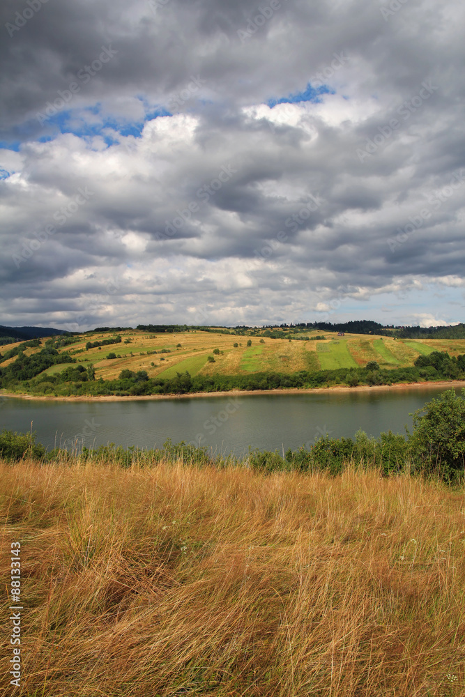 lake and dramatic sky in southern Poland lake and dramatic sky in southern Poland