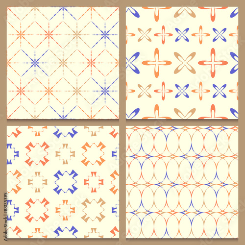 Set of four geometric seamless patterns with multicolored elemen