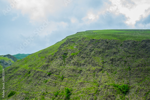 Mountains in the clouds in cloudy weather.The Caucasus. .Russia. photo