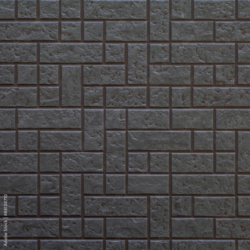 Naklejka premium Black modern wall tile background and texture