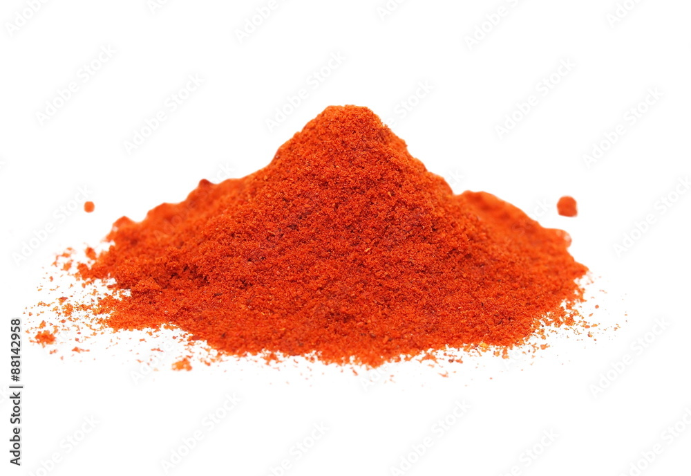 macro pile ground paprika isolated on white background macro pile ground paprika isolated on white background