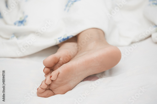 Feet of sleeping woman