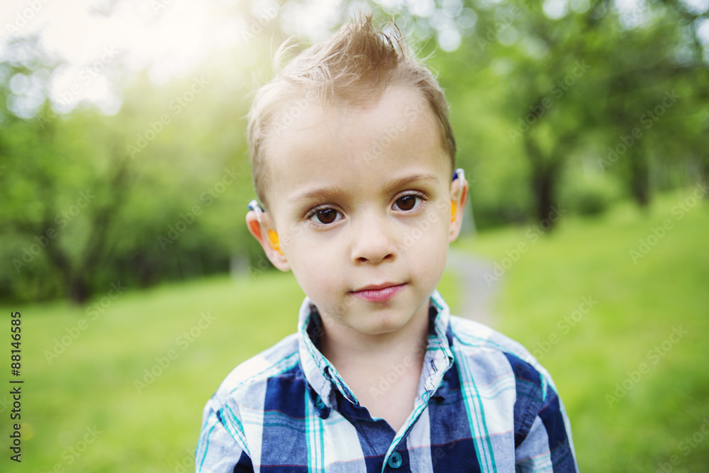 Portrait of cute little boy child outdoors on the nature Portrait of cute little boy child outdoors on the nature