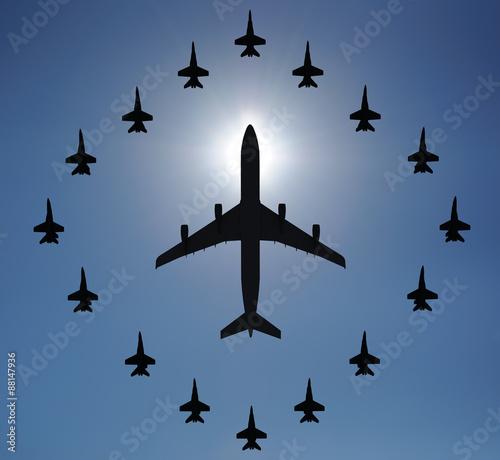 Airplane silhouettes in the sky