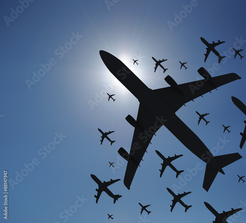 Airplane silhouettes in the sky