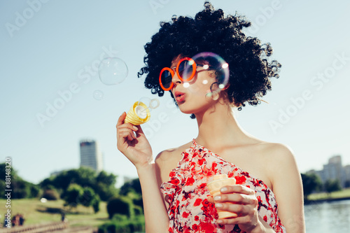 Vintage photo of soap bubble blower woman photo