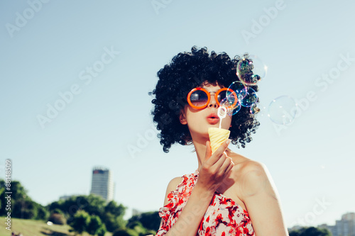 Vintage photo of soap bubble blower woman photo