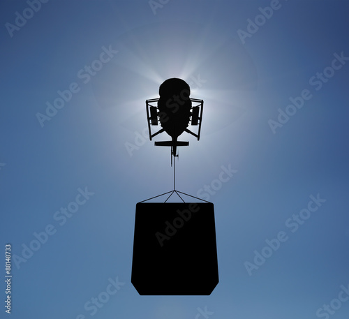 Helicopter silhouette in the sky