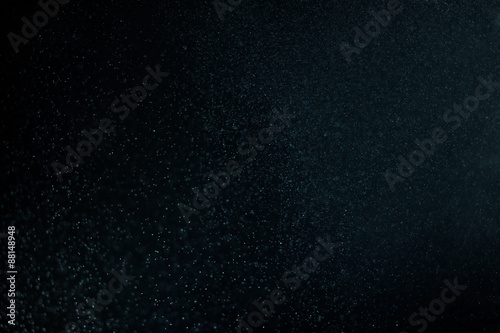 abstract dark bokhe lights background , purple,black and subtle gold. defocused background