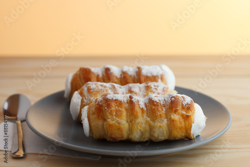 Sweet tubes filled egg white, Czech confection called Kremrole. photo