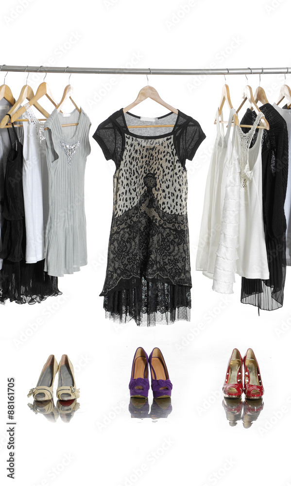 Set of casual fashion clothing on hangers and shoes Set of casual fashion clothing on hangers and shoes