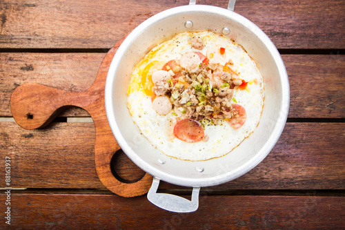 Pan-fried egg with toppings, Close up photo with selective focus