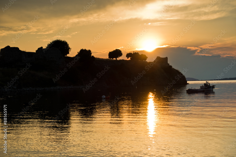 Sunset at Toroni bay near old roman fortress in Sithonia