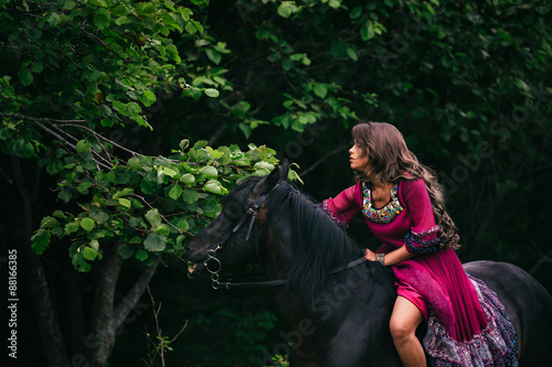 Beautiful woman on a horse