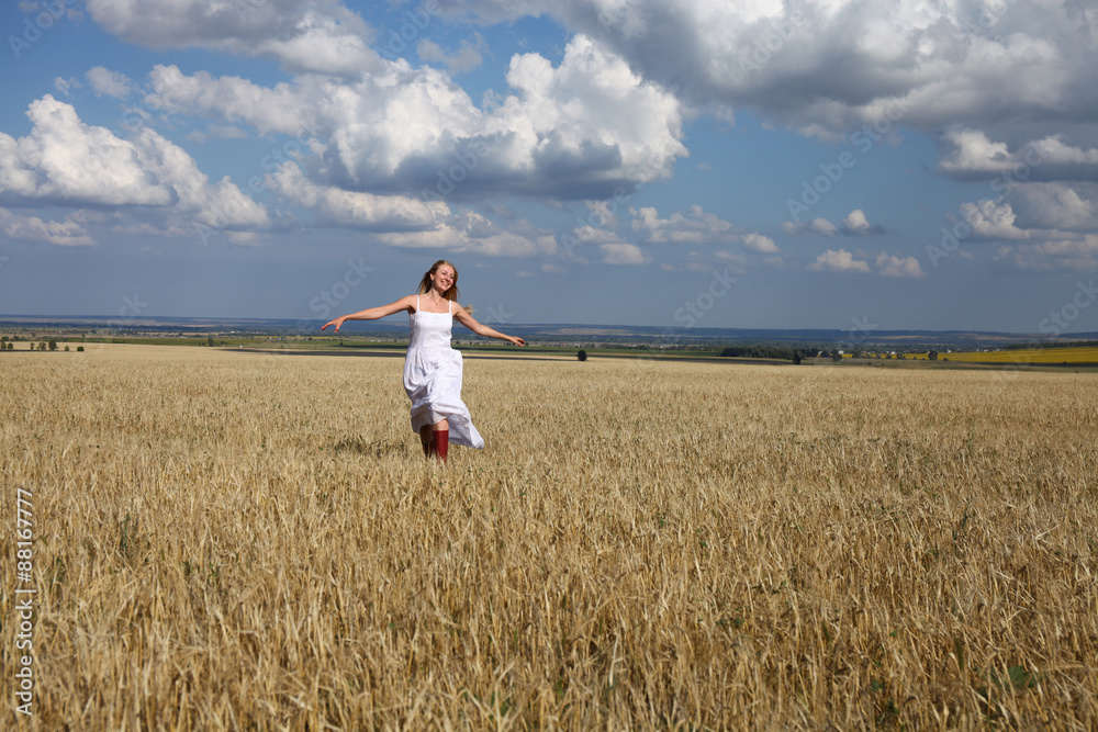 Full-length portrait of a beautiful young girl in a white dress Full-length portrait of a beautiful young girl in a white dress