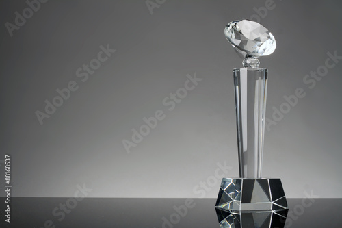 glass trophy in gray background