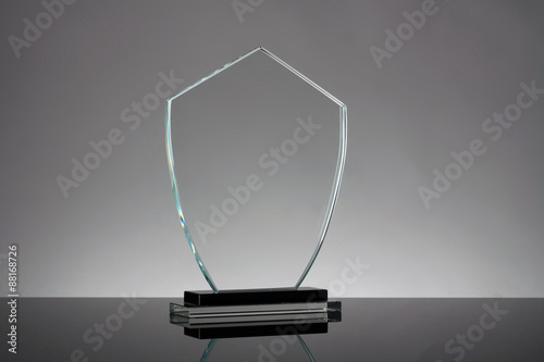 glass trophy in gray background
