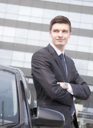 Handsome young businessman near his car © una0761