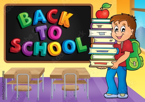 Boy holding books theme image 3