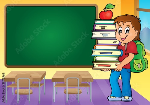 Boy holding books theme image 4