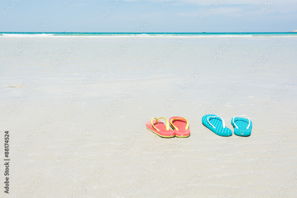 Beach, slippers on tropical beach Beach, slippers on tropical beach