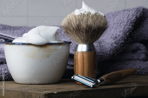 vintage Shaving Equipment on blue wooden Table photo