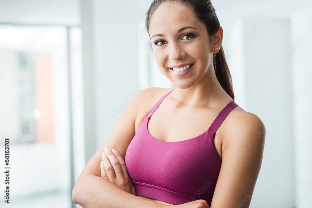 Young woman posing at the gym