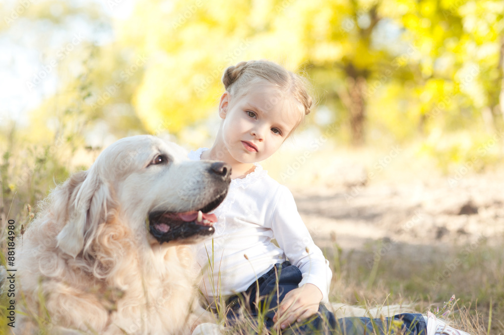Cute kid girl sitting with dog outdoors on nature background. Childhood. Cute kid girl sitting with dog outdoors on nature background. Childhood.