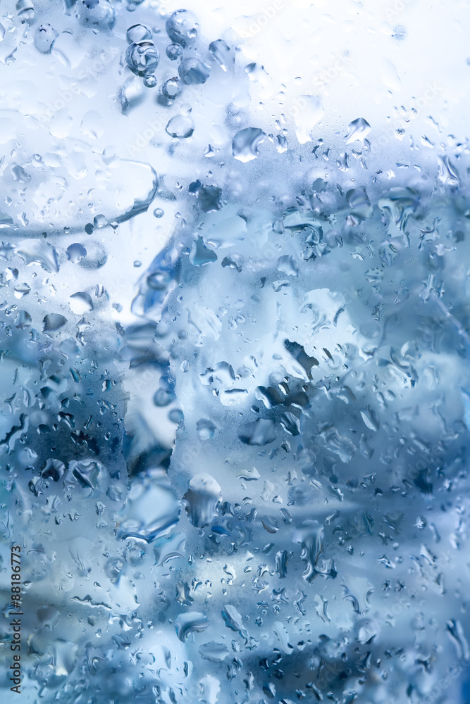 water drops on glass with ice. macro