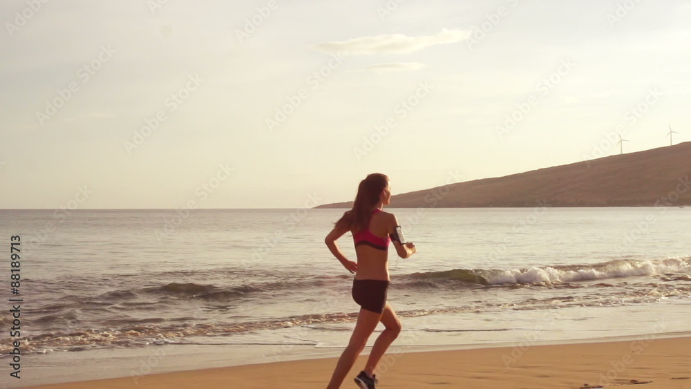 SLOW MOTION: Woman running on the beach at sunset in Hawaii
SLOW MOTION: Woman running on the beach at sunset in Hawaii