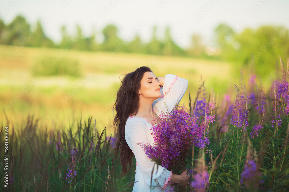 Girl with closed eyes, standing in a field poses Girl with closed eyes, standing in a field poses