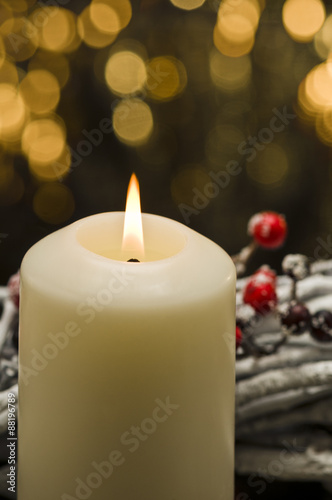 White candles in autumn winter decoration